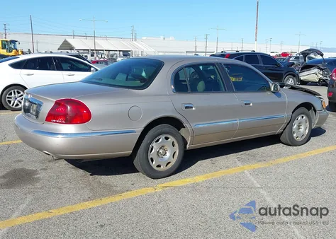 2000 Lincoln Continental z USA, uszkodzony, nr VIN 1LNHM97V0YY801677